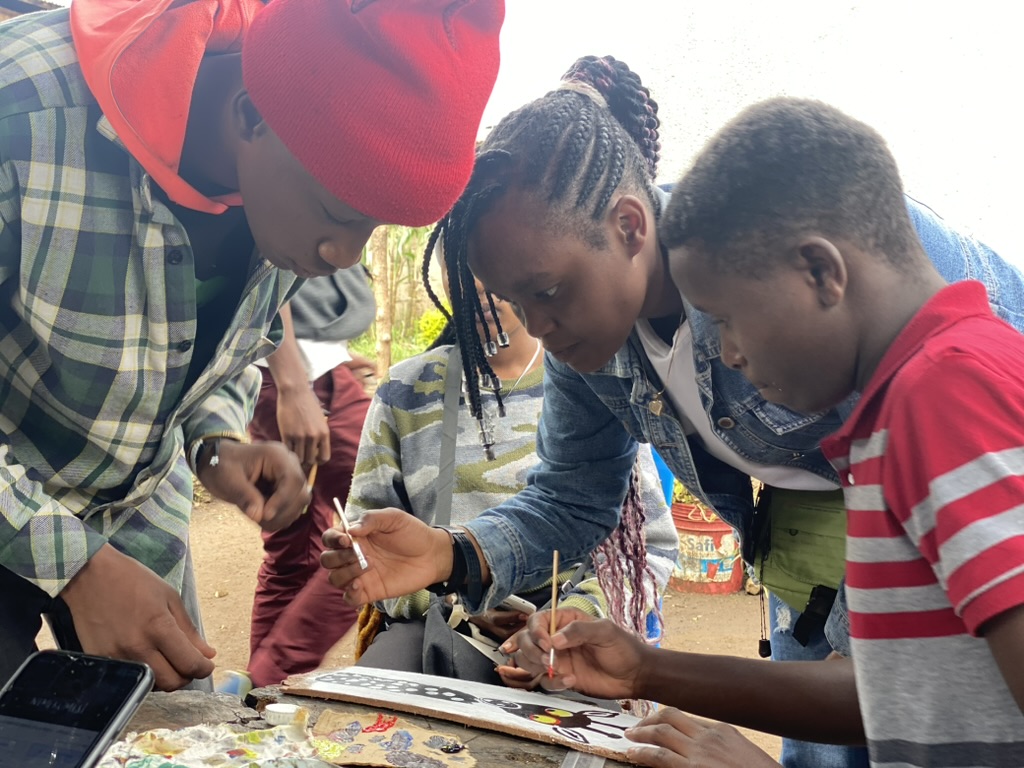 Young learners painting together