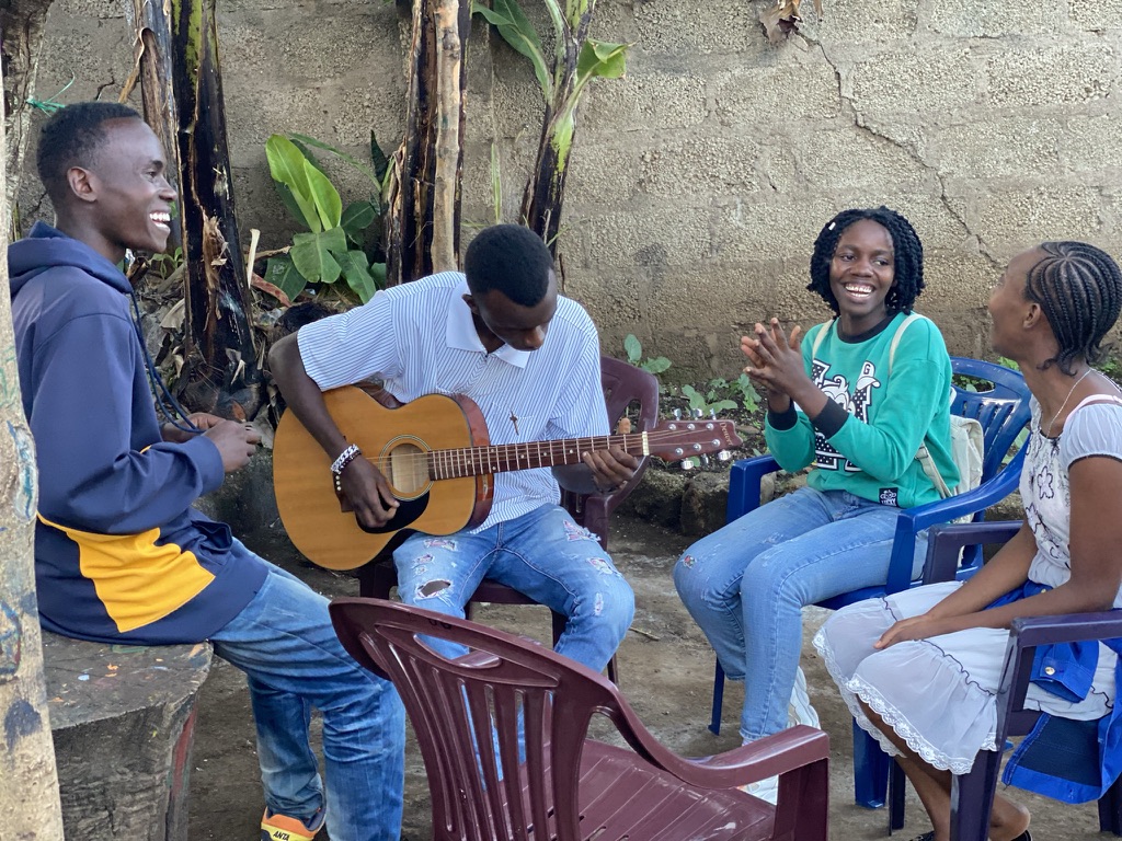 Youth learning music together